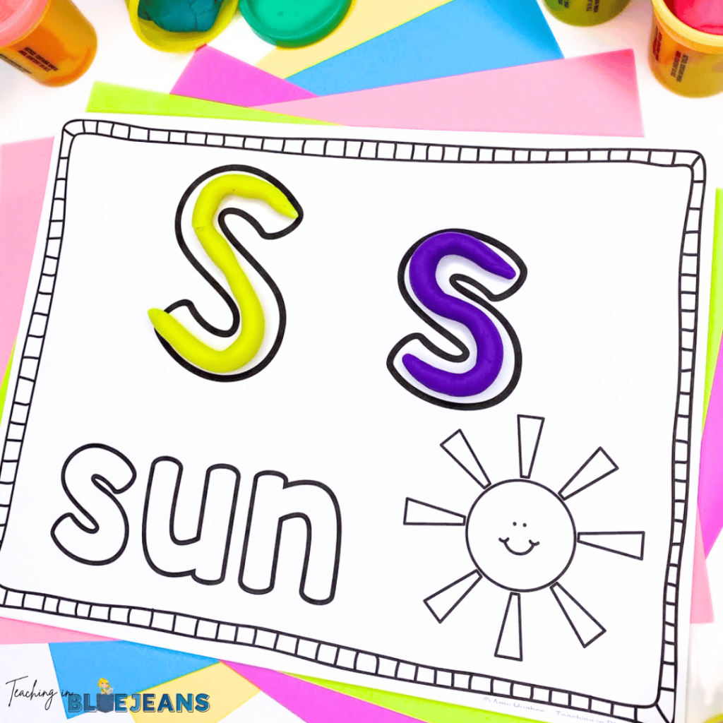 Activities like the playdough letter mat shown in this photo are perfect to use as writing activities in kindergarten and first grade.