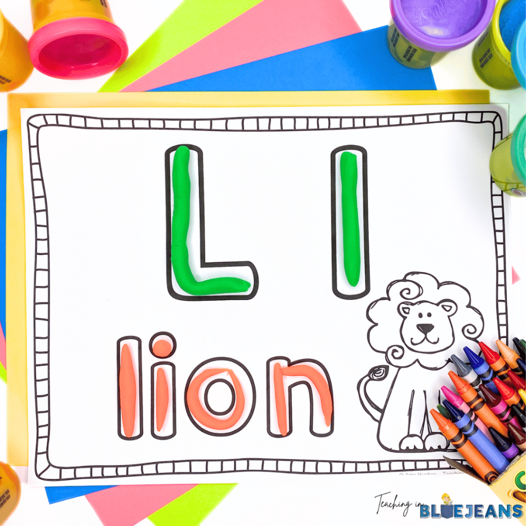 This photo showcases fine motor activities using playdough and letter mats.