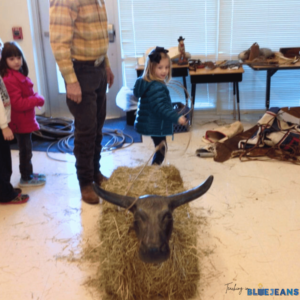 This photo showcases an experiential learning activity that helped students learn more about the Texas rodeo!
